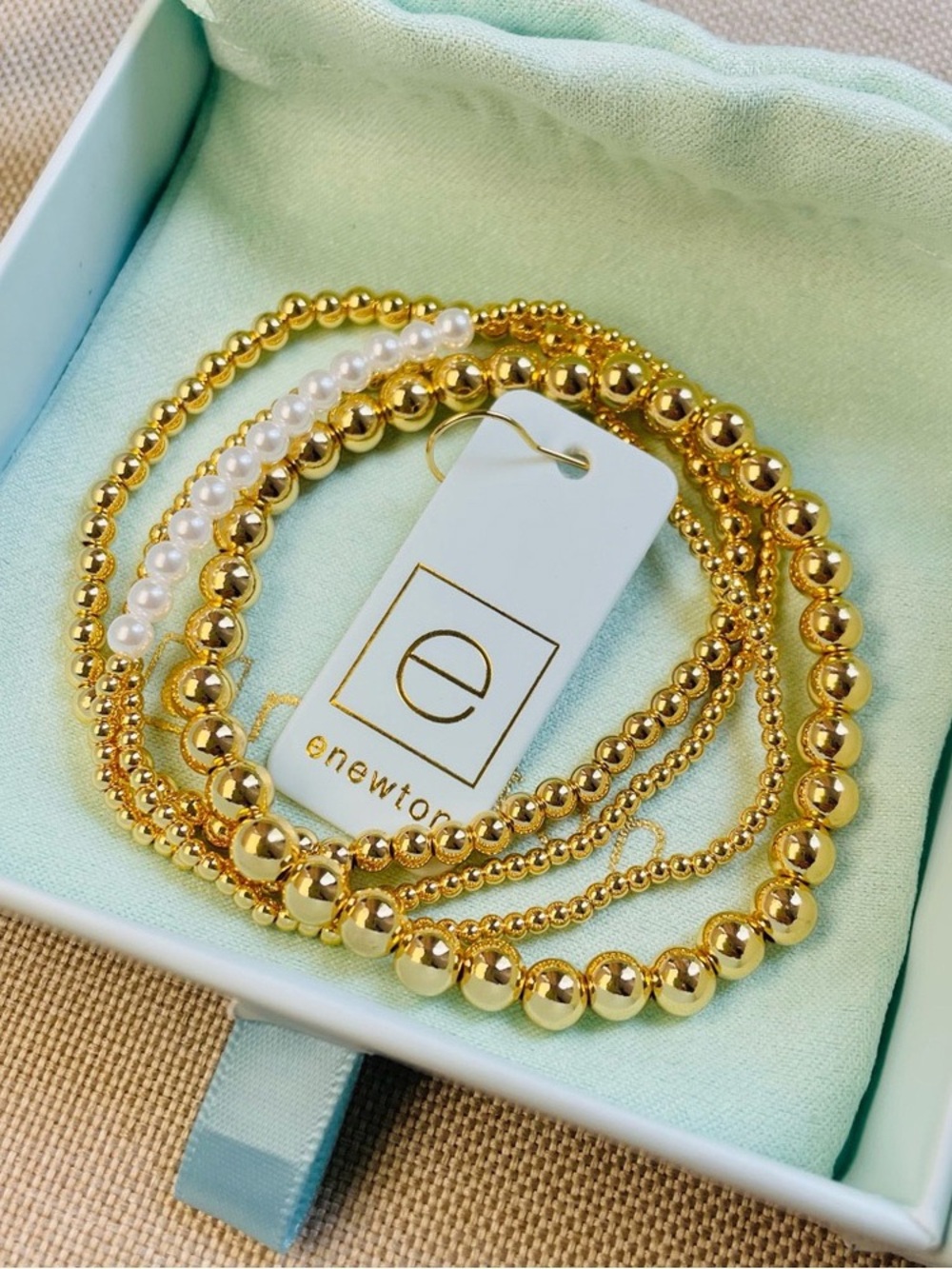 Enewton Four-Piece White Pearl Bracelet Set